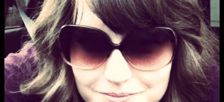 curly sunglass wearing mama